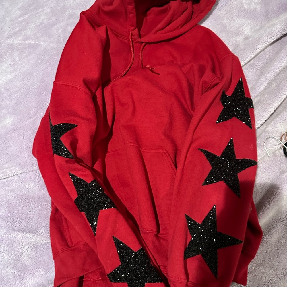 Carmar red hoodie with black rhinestone stars